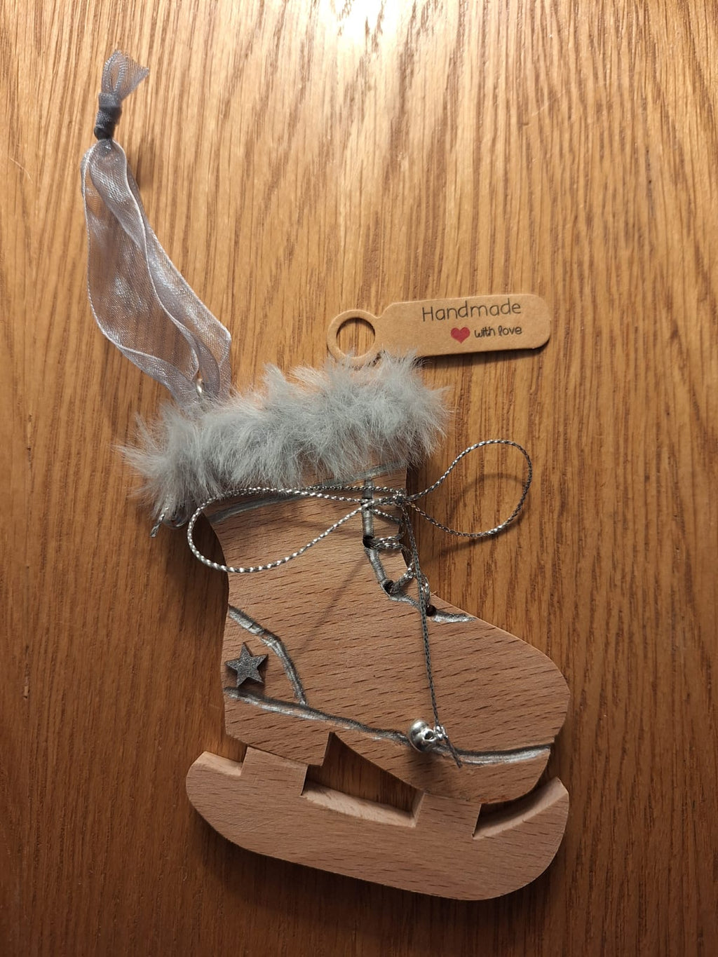 Set of 3 tree hanging skies, ice skates and lodge.