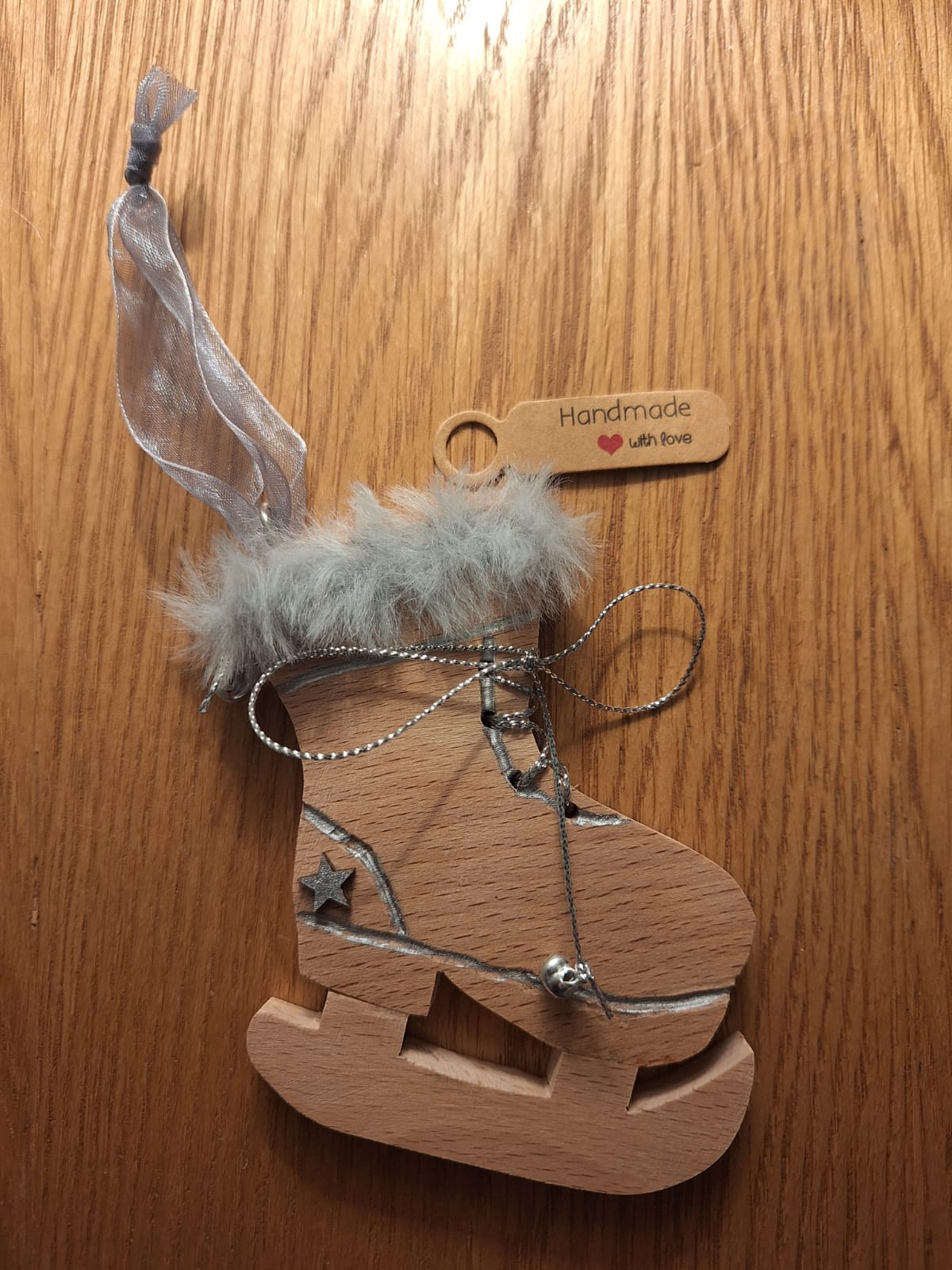 Set of 3 tree hanging skies, ice skates and lodge.