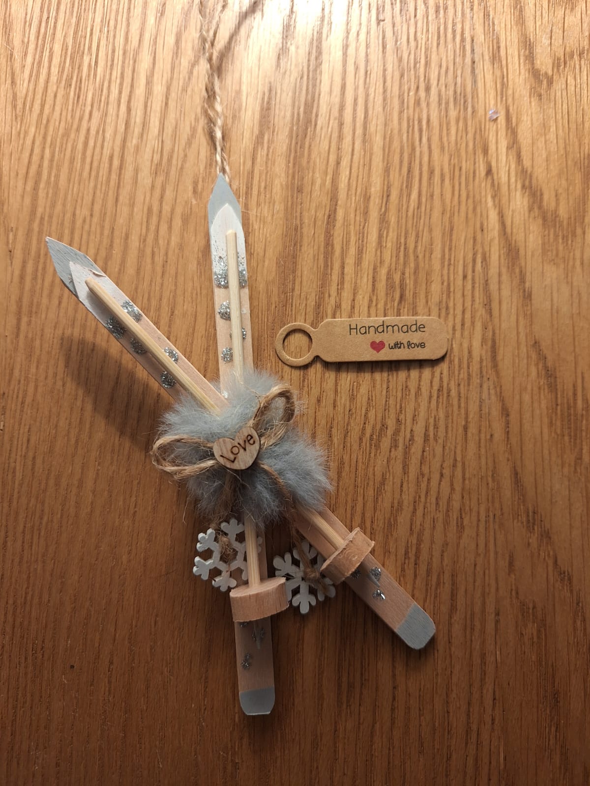 Set of 3 tree hanging skies, ice skates and lodge.